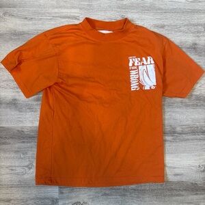 PacSun “Lose Your Fear of Being Wrong” orange graphic tshirt men’s